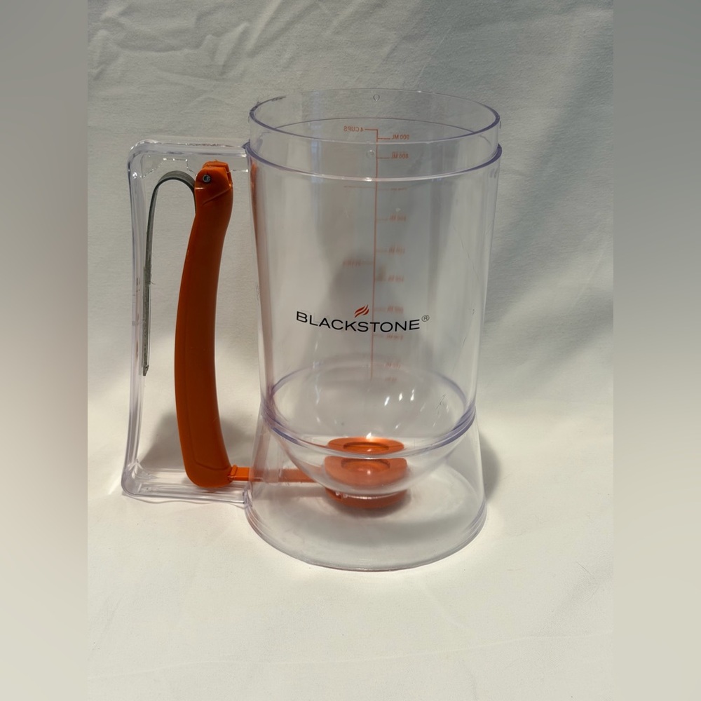 Blackstone Transparent pancake batter Dispenser with Orange Handle